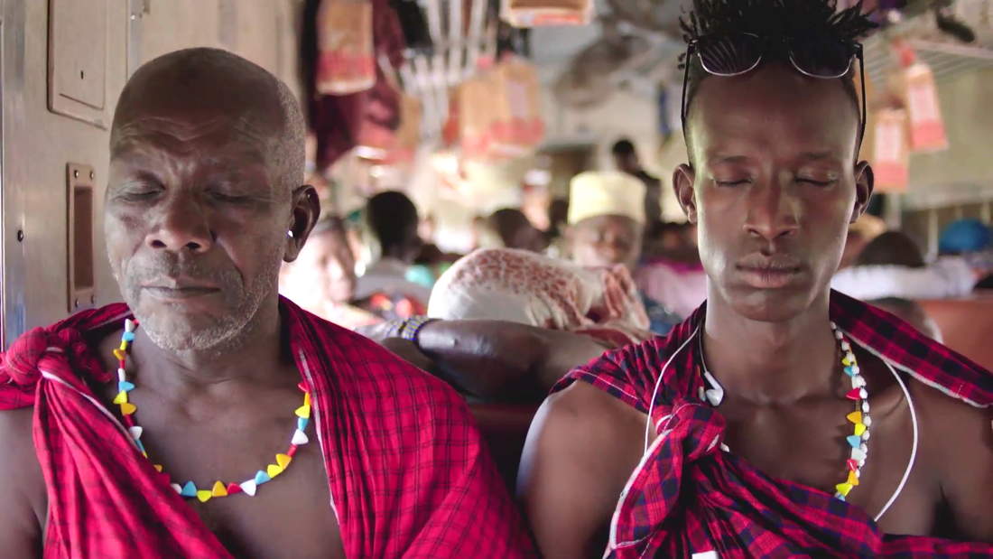 Tanzania Transit - Isaya en William in gebed